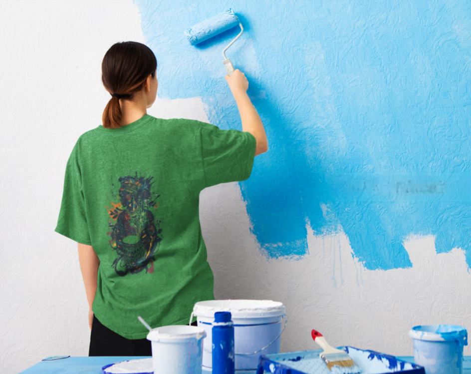 Green heather oversized t-shirt with a multi-colored artistic graphic on the back. Relaxed fit.